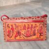 Ochre and red leather sling bag
