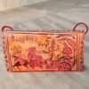 Ochre and red leather sling bag