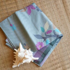 Pastel floral handwoven cotton saree from Bengal with grey base and colorful motifs