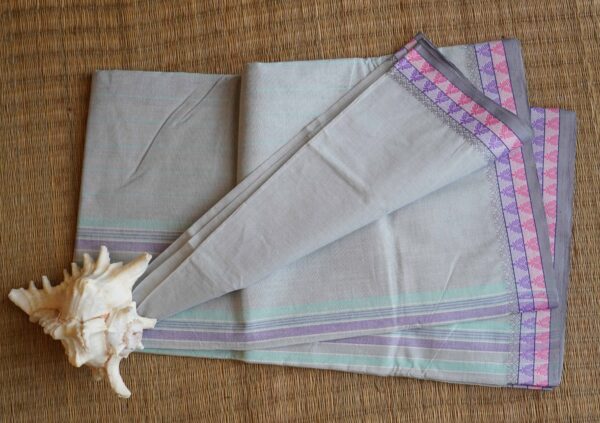 Pure cotton Bengal Tant saree with pastel stripes and violet border, handwoven and lightweight