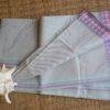 Pure cotton Bengal Tant saree with pastel stripes and violet border, handwoven and lightweight