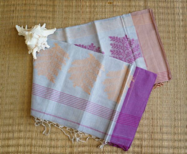 Pure cotton Jamdani saree with leaf needlework motifs and purple border, handmade in Bengal