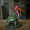 Bokocchop-sukumar-roy Bokocchop (বকচ্ছপ) hand-painted collectible miniature inspired by Sukumar Roy’s Abol Tabol, featuring the whimsical stork-tortoise hybrid on a display base