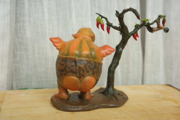 Rear view of the Kumro Potas collectible figure