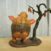 Rear view of the Kumro Potas collectible figure