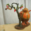 Front view of the Kumro Potash collectible sculpture with wooden display base