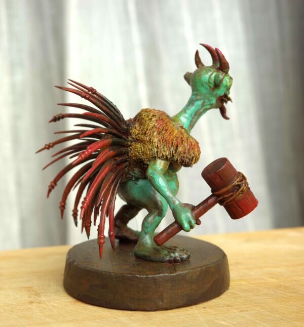 Bhoy-Peyo-Na-Sukumar-Roy Voy Peyo Na (ভয় পেয়ো না) hand-painted collectible miniature inspired by Sukumar Roy’s Abol Tabol, featuring the humorous horned character holding a lantern and club on a wooden display base