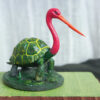 Bokocchop (বকচ্ছপ) hand-painted collectible miniature inspired by Sukumar Roy’s Abol Tabol, featuring the whimsical stork-tortoise hybrid on a display base