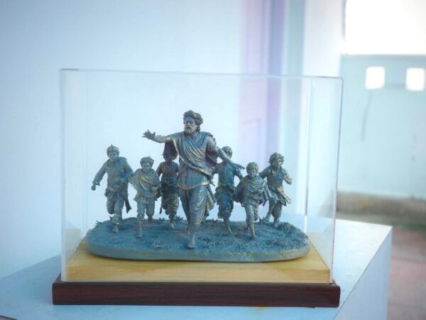 resistance 6 Resistance sculpture inspired by Satyajit Ray's Hirak Rajar Deshe, featuring Udayan Pandit leading the students